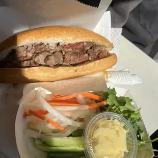 Banh mi Char Siu (Xa Xiu - red bbq pork)  Veggies and butter (on the side)