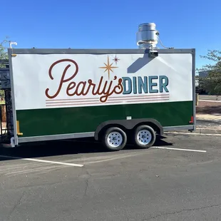 a food truck parked in a parking lot