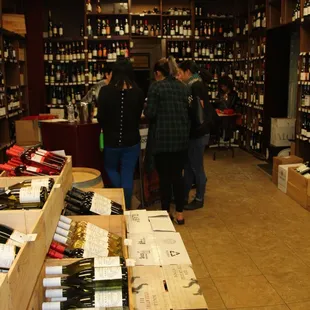 people in a wine shop