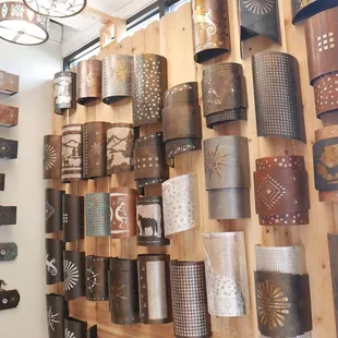 Another wall in our small lighting showroom. We display mostly southwestern but also some western, rustic and coastal lighting.