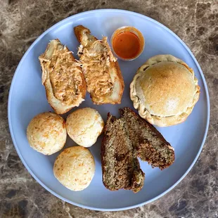 Clockwise: Coxinha-Chicken Croquette, Chicken Empada, Kibe-Beef Croquette ($4 each), Pão de Queijo (2 for $2.50)