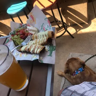 Great veggie taquitos for lunchtime. Farley enjoying his lunch on the patio also.