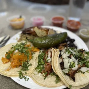 Jackfruit, butternut squash and chicken tacos.