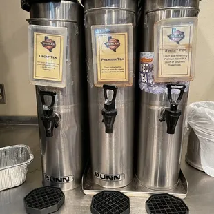 three coffee dispensers