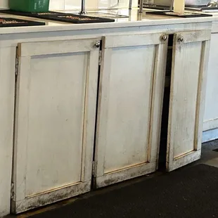 Dining area cabinets and hope my silverware didn't come from here.