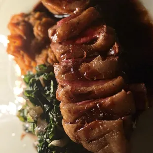 PAN SEARED DUCK BREAST L&apos;ORANGE SWEET POTATO MASHED, SAUTÉED SWISS CHARD