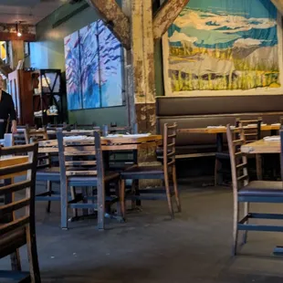 Woodsie atmosphere with bright colors on the wall.