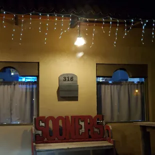 a bench in front of a restaurant