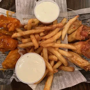 P &amp; P Extra Spicy and Red Chili Wings with Fries!