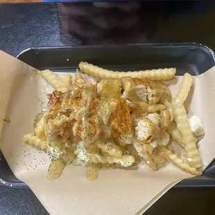 Chicken poutine- spicy chicken, fries, and a sage gravy