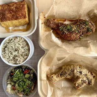 Cornbread, dirty rice, bean salad, herbs and garlic chicken, salted egg chicken