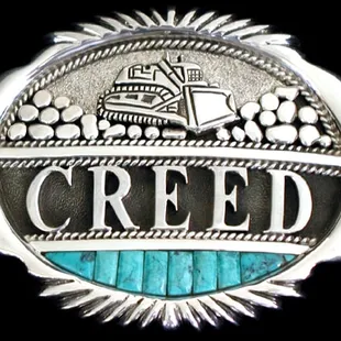 Peck's designed this One-of-a-Kind sterling silver handwrought buckle.