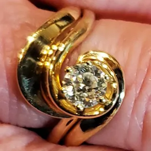 Ring was cut off, diamond reset, and the ring re-sized.