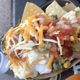 Nachos with a whole lot extra of sour cream