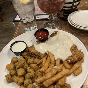 The chicken fried steak, fried okra, and steak fries. Of course a large wild berry margarita to accompany it.