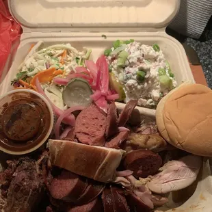 3 meat dinner. Chicken, beef, hot link. Double meat. Include: potato salad, dry coleslaw. Slider bun. I added pickled onions.