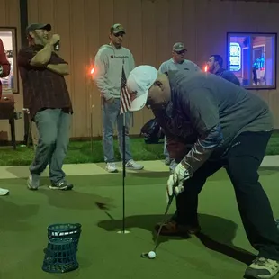 Sometimes we have putting contests, and sometimes it's with a junior putter.