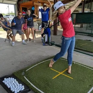 You can drink ... and "drive" at Peculiar Golf!