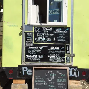 a food truck with menus