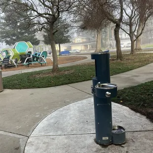 Big kid, fountain little kid, fountain, dog fountain, and water refill station. All are flowing.