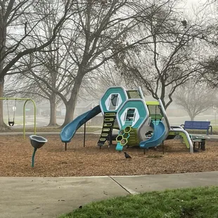Little kid play area includes toddler swings