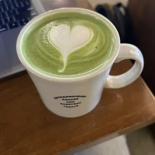 The matcha rose cardamom latte with the cutest for here mugs!