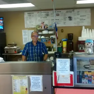 Pedro manning the counter. Lunch hot food bar, sandiwches, empanadas y guava pastries and coffe. :) very super nice guy