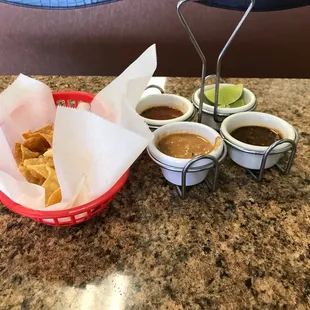 Gotta love the assortment of dipping options that come with the chips at the table