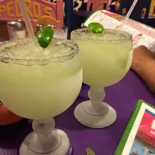 House margaritas... Big as a house!  Refreshing and sweet, not strong.