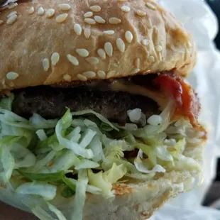 Shredded lettuce  toasty buns.