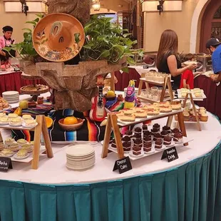 Dessert bar in center.