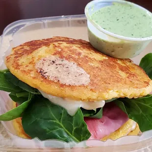Breakfast Arepa with ham, egg, spinach, and Fontina cheese!