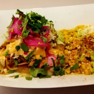 Columbian arepa with side of Mexican corn