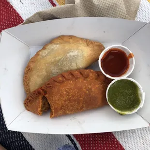 empanadas -- chorizo/polenta/cheddar + white bean/cheese/jalapeño.