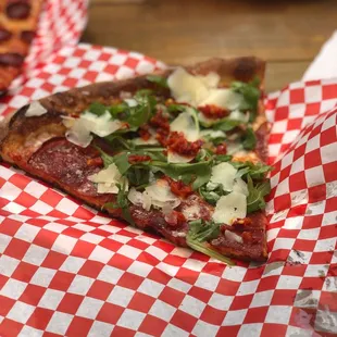 Slice of the day with salami and other items.