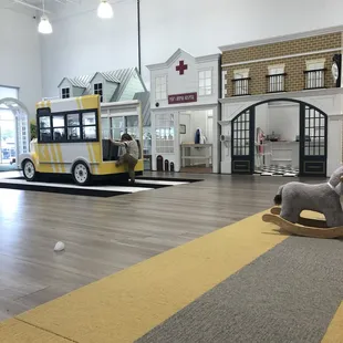 Ice cream store, vet office, play house and school bus