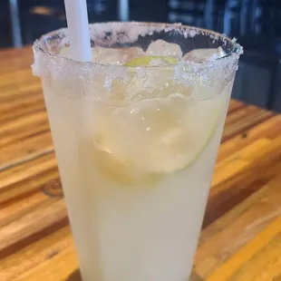 a margarita in a glass with a straw