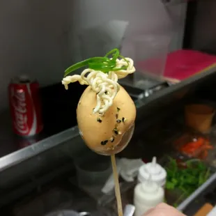 soy dyed egg on a stick
