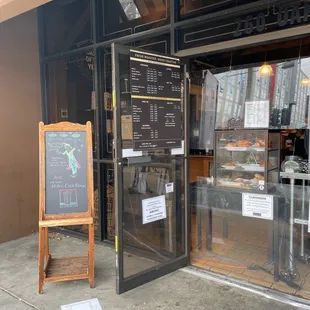 the entrance to a coffee shop