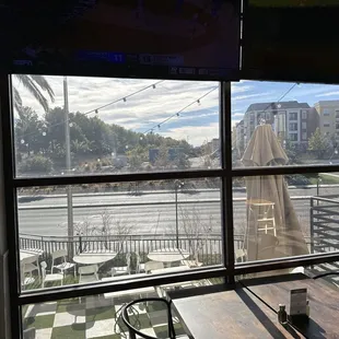 a view of a street through a window