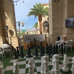 a giant chess set in a courtyard