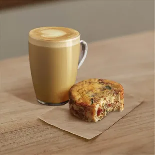 a muffin and a cup of coffee