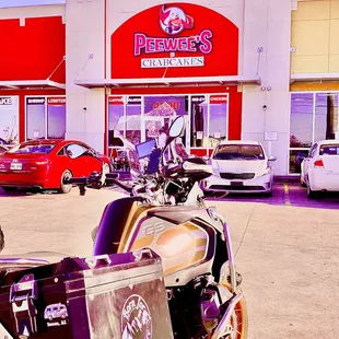 a motorcycle parked in front of a store