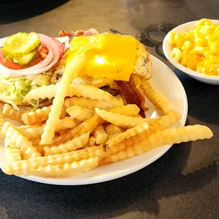 Bacon Cheeseburger with egg, fries and Molly mac