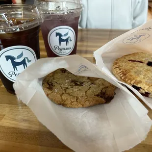 Salted almond toffee cookie, tayberry hand pie, cold brew and lotus drink