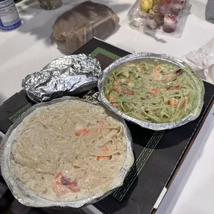 Prawn pesto and prawn Alfredo with garlic bread