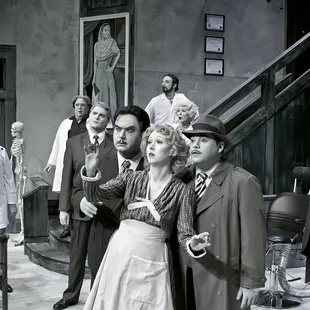 Unretouched color photograph (by Mark Oristano) of the cast of DEATH IS NO SMALL CHANGE!