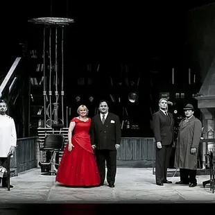 Unretouched color photograph (by Mark Oristano) of the cast of DEATH IS NO SMALL CHANGE!