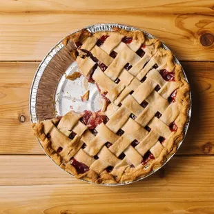 a freshly baked pie on a wooden table