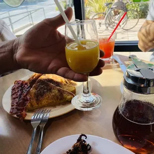 Look at the size of this mimosa. More like kids orange juice with three drops of champagne.